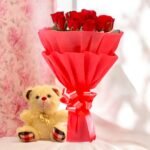 Better Gift Flowers Roses and Teddy combo with fresh red roses and a plush teddy bear, perfect for expressing love and affection.