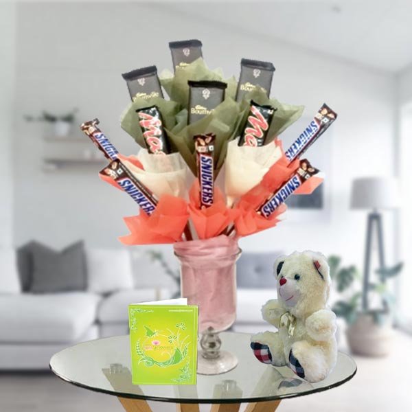 chocolates in a vase and teddy