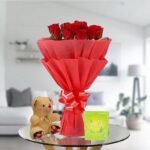red rose bouquet and teddy