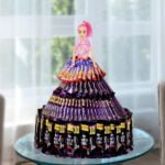 Chocolate doll with dairy milk chocolates and gems