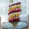 basket of roses with colorful layers of roses