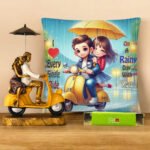 rain couple gift combo with cushion, scooter couple showpiece and chocolates