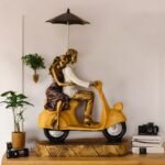 BetterGiftFlowers romantic Scooter Couple With Umbrella sculpture for home décor.
